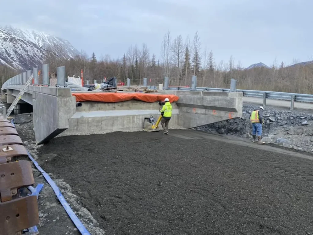 workers preparing roadbed quartz creek bridge